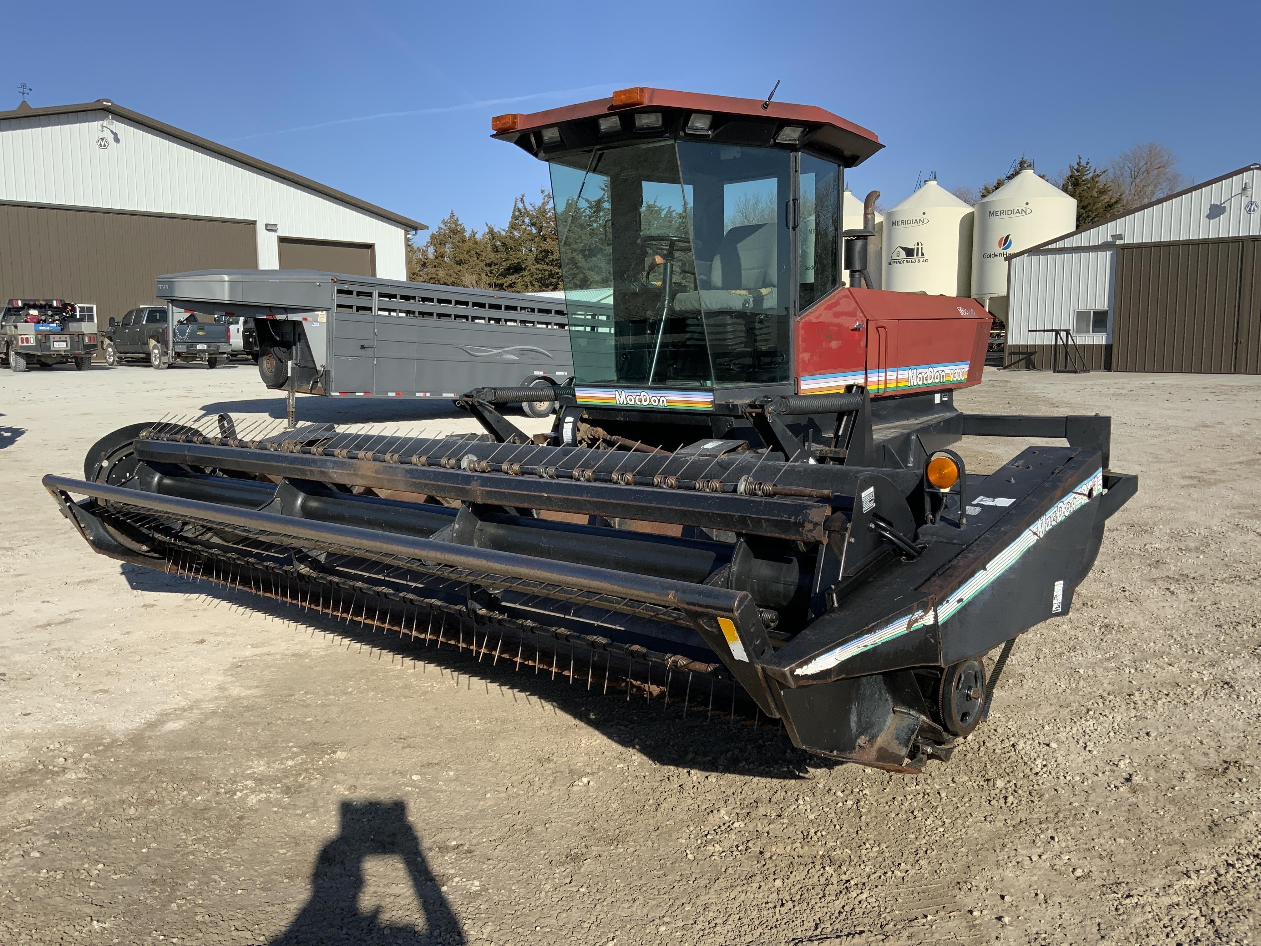 1997 MacDon 9300 Swather BigIron Auctions