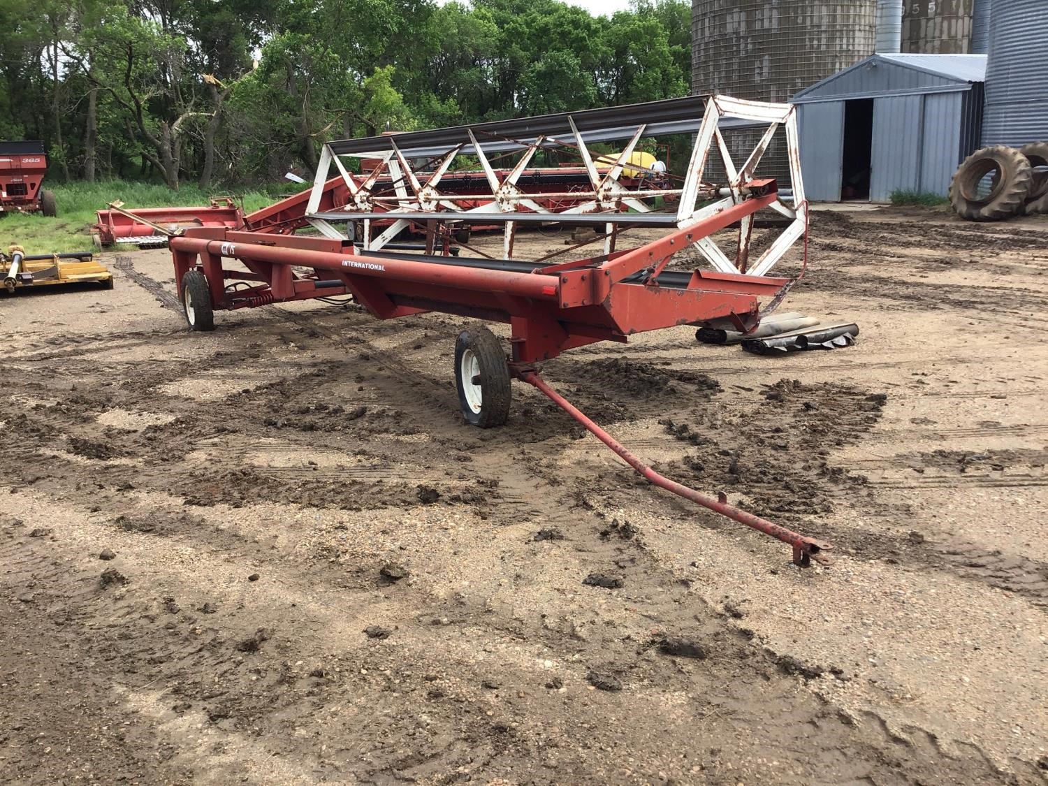 International 75 Swather On Transport BigIron Auctions