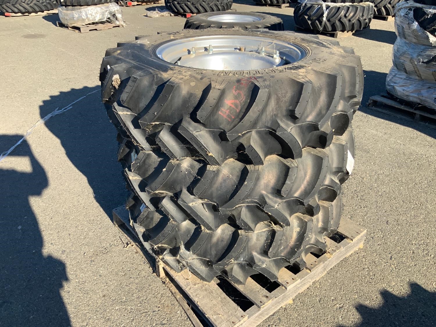 Titan 12.4-24 Hi-Traction Lug BigIron Auctions