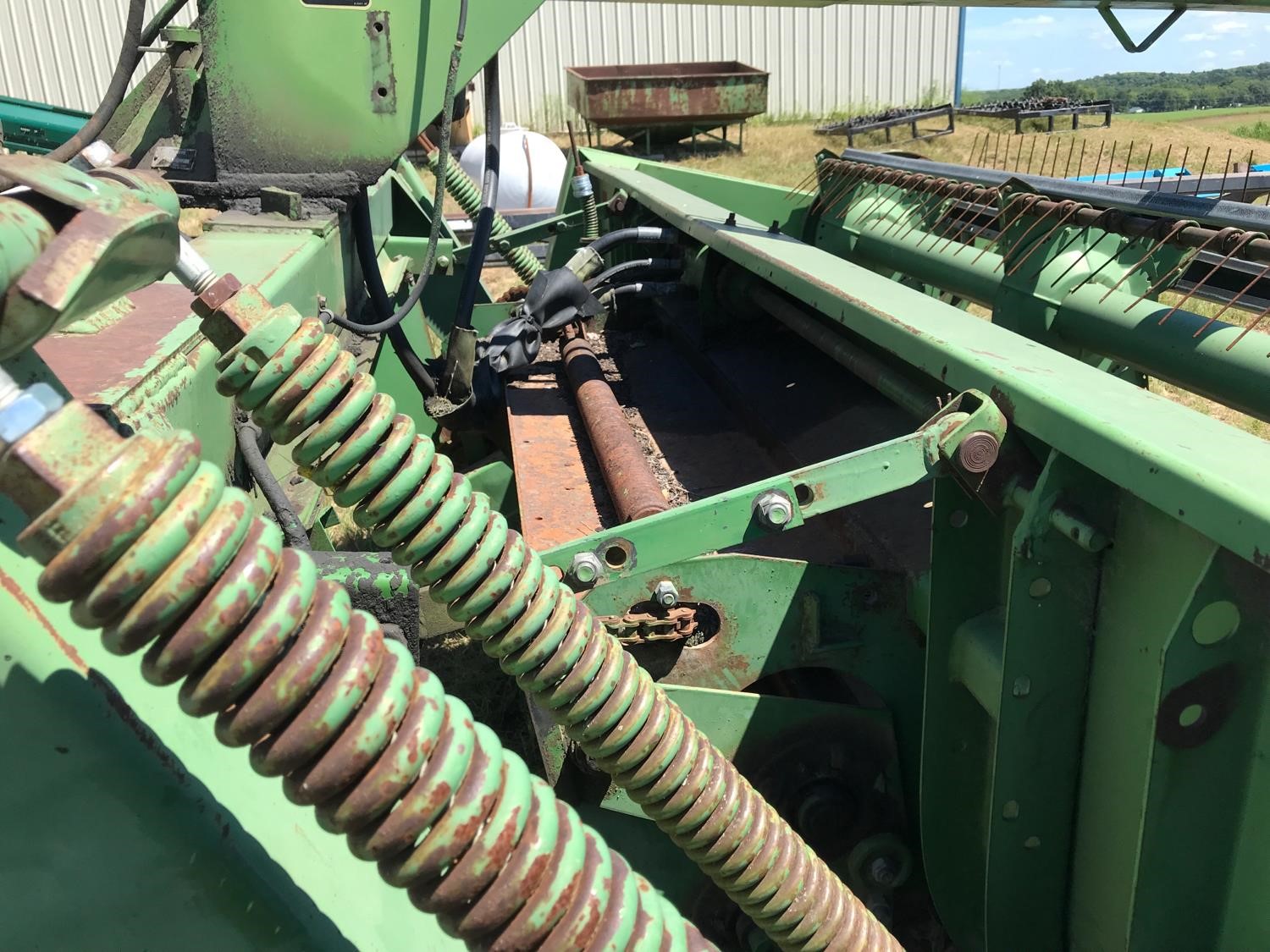 John Deere 300 Swather Bigiron Auctions 4430