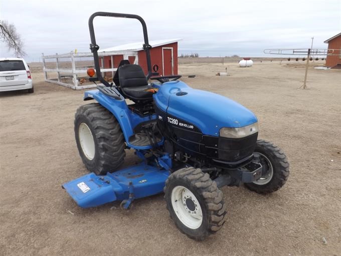 New Holland Tc29d Mfwd Compact Utility Tractor W 6 Deck Mower Bigiron Auctions