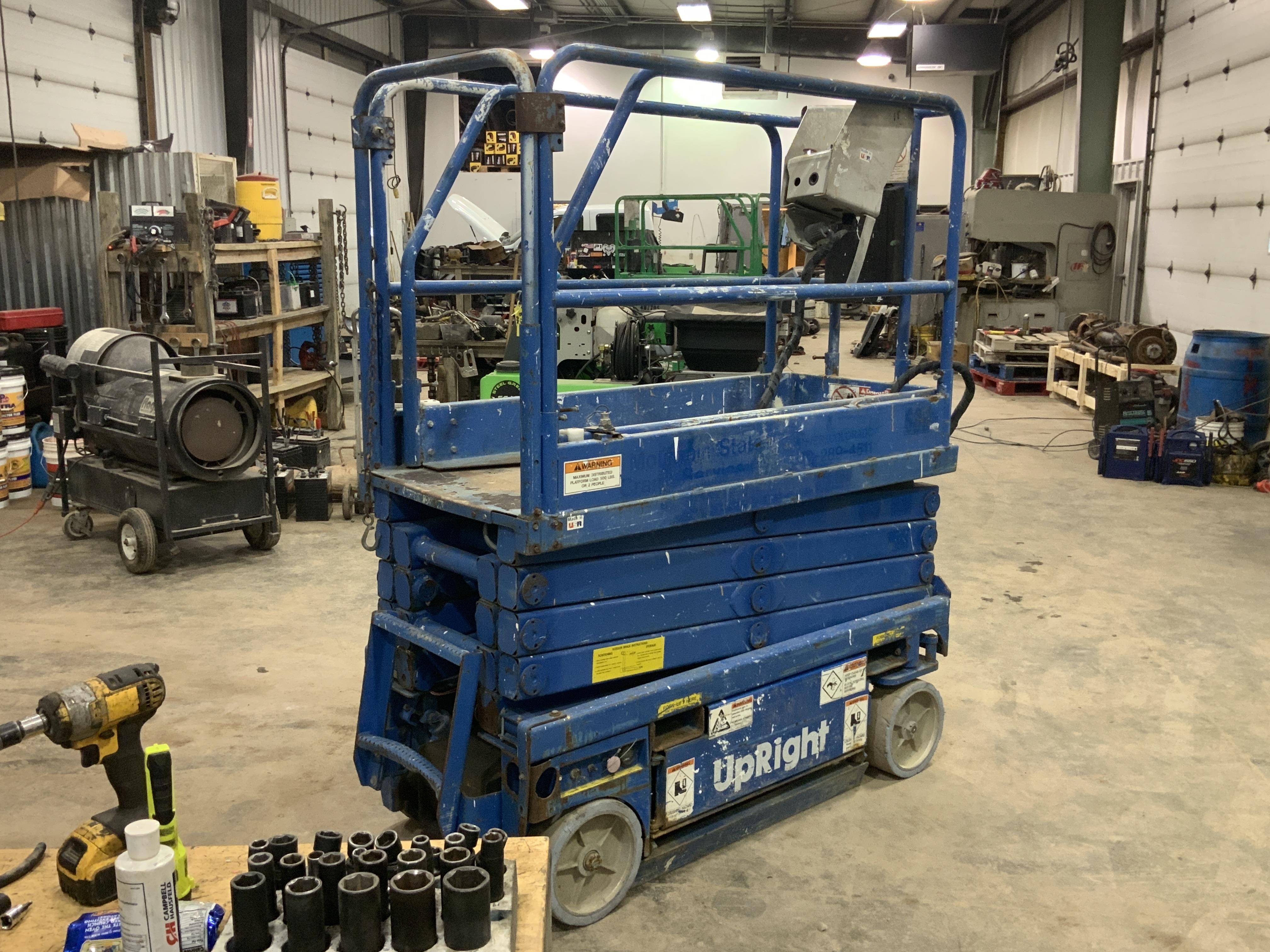 Upright 65700-010 Self-Propelled Scissor Lift BigIron Auctions