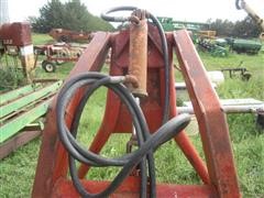 items/042d0fd21a35e41180bc00155dd1091d/newholland80balefork