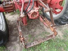 items/14cdddf28224e41180be00155de252ff/internationalfarmall460tractorwdualloader