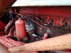 items/14cdddf28224e41180be00155de252ff/internationalfarmall460tractorwdualloader