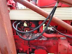 items/14cdddf28224e41180be00155de252ff/internationalfarmall460tractorwdualloader