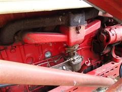 items/14cdddf28224e41180be00155de252ff/internationalfarmall460tractorwdualloader