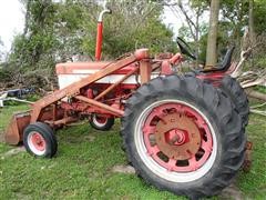 items/14cdddf28224e41180be00155de252ff/internationalfarmall460tractorwdualloader