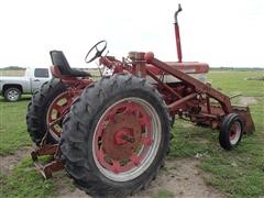 items/14cdddf28224e41180be00155de252ff/internationalfarmall460tractorwdualloader