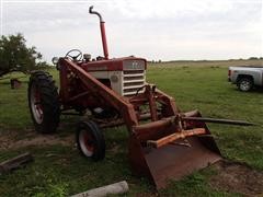 items/14cdddf28224e41180be00155de252ff/internationalfarmall460tractorwdualloader