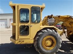 items/16725abeed99ea118b7100155d72eb61/caterpillar613elevatingscraper-13.jpg