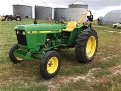 John Deere 1050 Tractor W/Loader & Attachments 