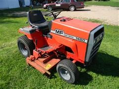 items/25c21ac54e27e41180be00155de252ff/1974masseyferguson1450lawnmower