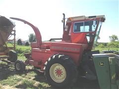 items/3060443cf023e41180be00155de252ff/newidea709unisystemforageharvesterwith868chopperand6221feederhouse