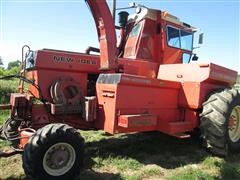 items/3060443cf023e41180be00155de252ff/newidea709unisystemforageharvesterwith868chopperand6221feederhouse