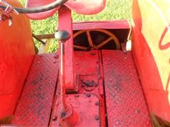 items/3cbd9c747229e41180be00155de252ff/1946-1948masseyharris20tractorwithbellymower