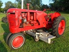 items/3cbd9c747229e41180be00155de252ff/1946-1948masseyharris20tractorwithbellymower