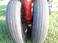 items/3cbd9c747229e41180be00155de252ff/1946-1948masseyharris20tractorwithbellymower