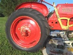 items/3cbd9c747229e41180be00155de252ff/1946-1948masseyharris20tractorwithbellymower