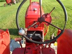 items/3cbd9c747229e41180be00155de252ff/1946-1948masseyharris20tractorwithbellymower