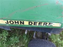 items/3e2a5a4bce28e41180be00155de252ff/unknjohndeeref910frontmowerlawnmower