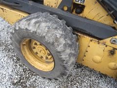 items/4303d219c62fe41180bf00155de252ff/newhollandl783skidsteer