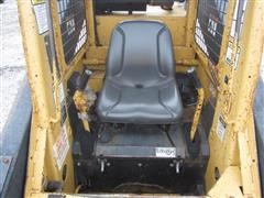 items/4303d219c62fe41180bf00155de252ff/newhollandl783skidsteer