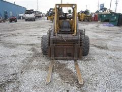 items/4303d219c62fe41180bf00155de252ff/newhollandl783skidsteer