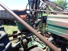 items/448be90c5ebdea11bf210003fff94c59/1949johndeerea2wdtractorw.farmhandf10loader-28.jpg