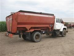 items/47301d15b516e41180be00155de252ff/1989fordl-8000feedtruck