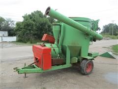 items/473305f3192fe41180bf00155de252ff/owatonna424grindermixer-2