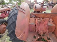 items/4b7c62605529e41180be00155de252ff/1950mccormick-deeringw9tractor