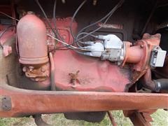 items/4b7c62605529e41180be00155de252ff/1950mccormick-deeringw9tractor