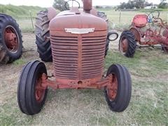 items/4b7c62605529e41180be00155de252ff/1950mccormick-deeringw9tractor