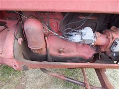 items/4b7c62605529e41180be00155de252ff/1950mccormick-deeringw9tractor