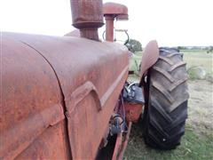 items/4b7c62605529e41180be00155de252ff/1950mccormick-deeringw9tractor