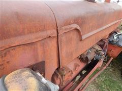 items/4b7c62605529e41180be00155de252ff/1950mccormick-deeringw9tractor