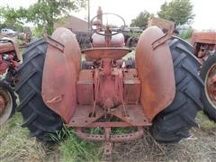 items/4b7c62605529e41180be00155de252ff/1950mccormick-deeringw9tractor