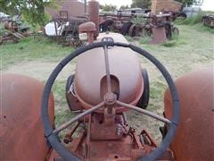 items/4b7c62605529e41180be00155de252ff/1950mccormick-deeringw9tractor