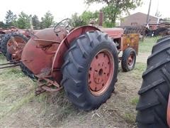 items/4b7c62605529e41180be00155de252ff/1950mccormick-deeringw9tractor