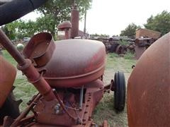 items/4b7c62605529e41180be00155de252ff/1950mccormick-deeringw9tractor