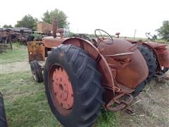 items/4b7c62605529e41180be00155de252ff/1950mccormick-deeringw9tractor