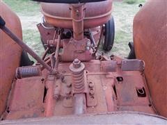 items/4b7c62605529e41180be00155de252ff/1950mccormick-deeringw9tractor