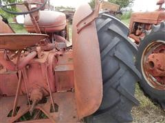 items/4b7c62605529e41180be00155de252ff/1950mccormick-deeringw9tractor