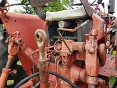 items/4f601f5216bc420fb50b999658f4178f/1972farmall1066tractorwkoyker500loader_73775039182c458f8fa6ac291842b93d.jpg