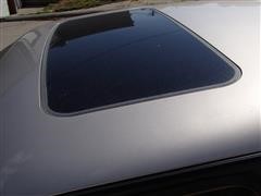 items/547a05519545e41180bf00155de1c209/1997pontiacbonnevillessei4doorsedan