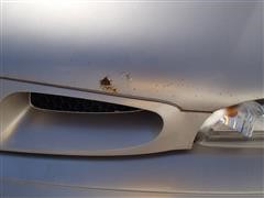 items/547a05519545e41180bf00155de1c209/1997pontiacbonnevillessei4doorsedan