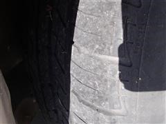 items/547a05519545e41180bf00155de1c209/1997pontiacbonnevillessei4doorsedan