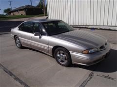 items/547a05519545e41180bf00155de1c209/1997pontiacbonnevillessei4doorsedan