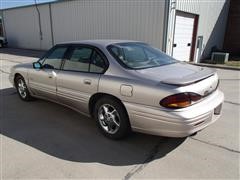items/547a05519545e41180bf00155de1c209/1997pontiacbonnevillessei4doorsedan